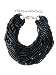 This multi-strand necklace can be worn as simple strands or with a twist. It features high-luster plastic beads and is lightweight at only 7OZ/19 IN long, with an extension of up to 24 IN. It is easy to travel with, and the luster of the beads can dress up a simple T-shirt or show off the luster of the beads with a night dress. Original Necklace, Simple T Shirt, Coral Necklace, Simple Tshirt, Bohemian Necklace, Agate Necklace, Black Necklace, Multi Strand Necklace, Plastic Beads