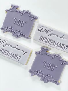 three bridesmaid name tags are shown on a white surface with the words what do they mean?