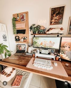 a desk with two computer monitors, keyboard and mouse on it in a home office