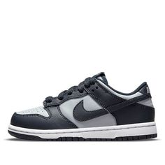 The Nike Dunk Low PS ‘Georgetown’ delivers a two-tone edition of the retro hoops shoe in the signature colors of the Hoyas. Made with a leather upper in Wolf Grey and Dark Obsidian overlays, this shoe is perfect for little kids who want to show their support for their favorite team. The Nike branding on the woven tongue tag and heel tab adds a touch of style, while the low-cut collar allows for a full range of motion. The perforated detailing at the toe box offers improved breathability, and the dark navy rubber outsole provides excellent traction. (SNKR/Skate/Casual/Low Top/Classic/Colorblock) Nike Dunk Low Georgetown, Cute Nike Shoes, Hype Shoes, Cute Nikes, Shoe Inspo, Swag Shoes, Grey Sneakers, Nike Dunk Low, Dream Shoes