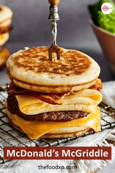 a stack of pancakes sitting on top of a cooling rack