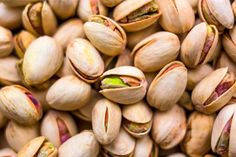 pistachio nuts are shown in close up