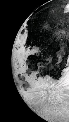 an image of the moon taken from space in black and white, with stars all over it