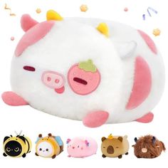 the stuffed animals are all different colors and sizes, including one with a pig on it's face