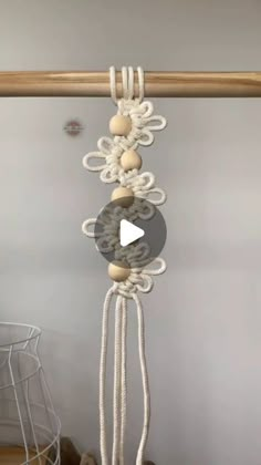 a video demonstrating how to make macrame wall hangings with yarn and beads