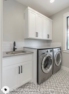 a washer and dryer in a white laundry room