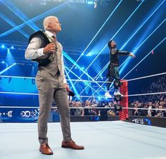 an image of a wrestler standing in the ring