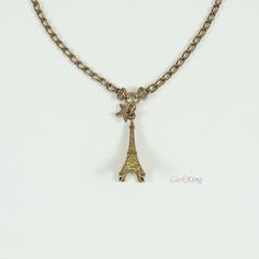 "LarkKing NE70 French love charm necklace Gold filled stainless steel, Czech crystal Size: tower, 1/2\"x1\" Gold filled stainless steel chain, length, 15\", adjustable +2\" Eiffel tower, Paris charm, similar item: NE36 Gift boxes are available at https://www.etsy.com/shop/LarkKing?section_id=20001206 Sterling silver initials (add-on) are available at https://www.etsy.com/shop/LarkKing?section_id=20032040. Hand stamped sterling silver initials, gold filled hand stamped sterling silver initials, r Tower Eiffel, Eiffel Tower Necklace, Paris Necklace, French Love, Paris Jewelry, Sterling Silver Initial, Gold Charm Necklace, Czech Crystal, Love Charms