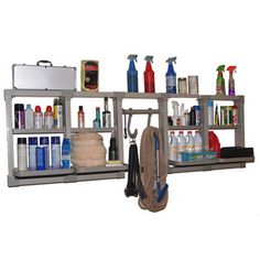 an assortment of personal care items displayed on shelving unit with mirror and shelf above