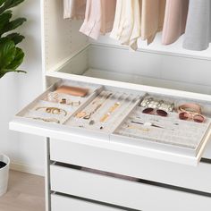 the drawers are organized and ready to be used for storing jewelry, bracelets, and other personal items