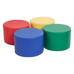 three different colored stools sitting next to each other