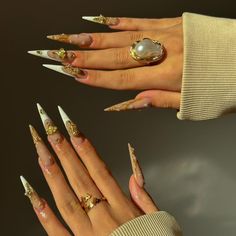 Sharp Nails Design Ideas, Long Dramatic Nails, Fall Long Almond Nails, Stiletto Vacation Nails, Gold Charms Nails, Stiletto Fall Nails Designs, Gold Headpiece Prom, Birthday Nails Stiletto Long, Pointy Nail Designs Stilettos