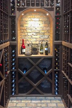 a wine cellar with several bottles of wine in it