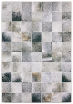 a gray and white rug with squares on it