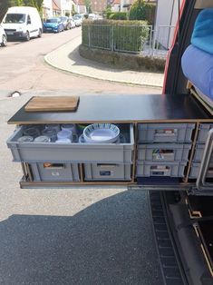 the back end of a truck with drawers in it