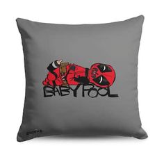 a grey pillow with a cartoon character on it that says baby fool in black letters