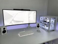 a desktop computer sitting on top of a white desk