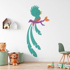 a child's room with a wall decal that has a bird on it