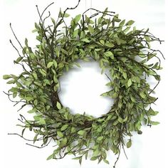 a green wreath hanging on the wall