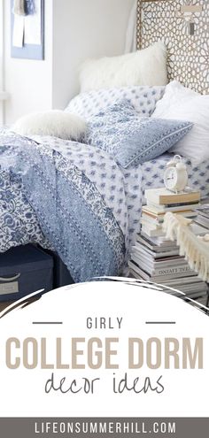 a college dorm bed with blue and white comforter, pillows and books on it