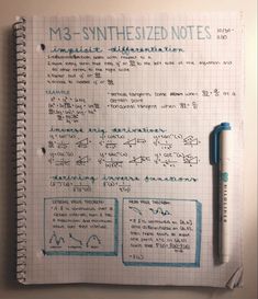 a notebook with notes written on it and a pen