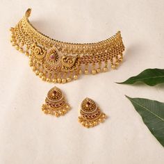 Shop Now: Tarinika's Temple Classic Antique Choker Set Choker Necklace Indian Antiques, Vintage Gold Necklace Indian, 5 Tola Gold Necklace Set Design, Indian Gold Jewelry Sets, Indian Jewelry Sets Bridal, Gold Set For Bride, 15 Gm Gold Necklace Design, Simple Choker Gold Indian, Rakhdi Borla Designs