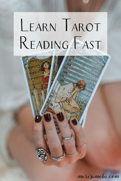 a woman holding three tarot cards in her hands with the text learn tarot reading fast