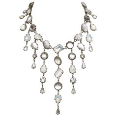 Fabulous De Luxe NYC/A'dam silver tone and art glass drop necklace with a curb link extension chain. Dropping from the necklace are beautiful white, clear and opaline glass drops. The necklace measures length 53.34cm / 21 inches, and the longest drop is 13.8cm / 5.4 inch. This quality necklace is in very good condition, the back retains some of the original patina. This is a glamorous and detailed vintage necklace by Dutch designer Michiel Alexander Ansignh who founded De Luxe NYC/A'dam. It look Silver Teardrop Jeweled Necklace, Silver Drop Jewelry With Jewels, Silver Teardrop Necklace With Jewels, Silver Drop Necklace With Cabochon, Silver Drop Necklace With Jewels, Silver Briolette Crystal Jewelry, White Crystal Dangle Necklaces, Link Extension, Adam Silver