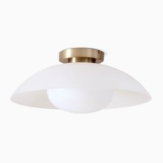 an image of a ceiling light with white glass shade on the top and gold trim