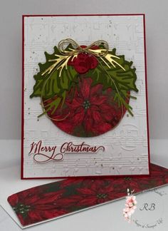 a christmas card with poinsettis on it