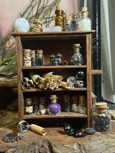 a wooden shelf filled with lots of different items