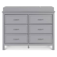 a gray dresser with six drawers and two doors