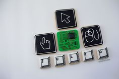 four different types of electronic components displayed on a white surface with black and white symbols