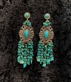 My jewelry is inspired by my Romanian, Inca and Spanish heritages, which were blended while I was growing up in Panama.  My father was Romanian, and my mother half Inca and half Spanish. Green Bohemian Chandelier Earrings With Dangling Beads, Bohemian Turquoise Chandelier Drop Earrings, Bohemian Turquoise Chandelier Earrings As A Gift, Turquoise Teardrop Chandelier Earrings, Bohemian Green Teardrop Chandelier Earrings, Green Bohemian Teardrop Chandelier Earrings, Green Bohemian Chandelier Earrings Nickel Free, Nickel Free Green Bohemian Chandelier Earrings, Turquoise Dangle Clip-on Earrings As Gift