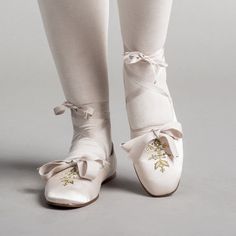 Bring your Regency dreams to life with the perfect pair of delicate dancing slippers. The Penelope slippers offer beauty, comfort, and versatility with so many color pairings, ways to wear the ribbons, and a soft yet durable construction. These slip-on shoes are accurate for c. 1800 - 1830. They feature a beautiful satin upper embroidered with a historical design on the vamp, complete with spangles. The edges are bound in petersham, with matching optional ankle ribbons and vamp bow which is easi Regency Shoes Women, Regency Era Shoes, 1820s Shoes, 1800 Shoes, Regency Slippers, Victorian Slippers, Regency Shoes, Vintage Slippers, American Duchess