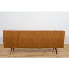 The teak sideboard was designed by Sven Andersen in the 1960s for Sven Andersen's Norwegian factory, Möbelfabrik Stavanger. The furniture has been professionally restored by removing old coatings, stained with oak stain and finished with high-quality Danish oil. The long version of the chest of drawers with 3 cabinets and 6 drawers is a very rare piece, an example of Norwegian design from the mid-20th century. The furniture has profiled handles and edges. The lower strip is profiled and the legs Norwegian Design, Mid Century Sideboard, Teak Sideboard, Storage Credenza, Oak Stain, Danish Oil, Stavanger, Credenza Sideboard, Casegoods