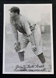 an old black and white photo of a baseball player