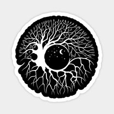 a black and white drawing of a tree in the shape of a human eye with branches