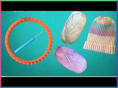 three balls of yarn, one ball of knitting needles and the other two knitted hats