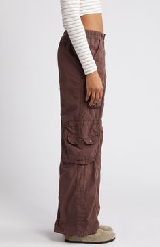 Tap into the retro look you missed the first time around in these all-cotton cargo pants featuring commodious bellows pockets to hold most everything you need. Exclusive retailer 31" inseam; 23 1/2" leg opening; 9 1/2" front rise; 13 1/2" back rise (size Medium) Back elastic waist 100% cotton Machine wash, line dry Made in Turkey 90s Style Cargo Pockets Bottoms For Streetwear, 90s Style Bottoms With Cargo Pockets For Streetwear, 90s Style Cargo Pants With Side Pockets For Streetwear, Relaxed Fit Full Length Cargo Pants With Multiple Pockets, 90s Style Cargo Pants For Streetwear With Side Pockets, Cargo Pants With Patch Pockets And Loose Fit, 90s Cargo Style Bottoms For Fall, 90s Style Baggy Pants With Cargo Pockets, Cotton Parachute Pants With Hip Pockets