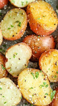 potatoes with herbs and seasoning in a pan