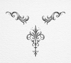 three ornate designs on white paper