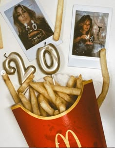 a mcdonald's bag full of french fries and pictures