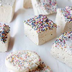 several pieces of cake with sprinkles on it