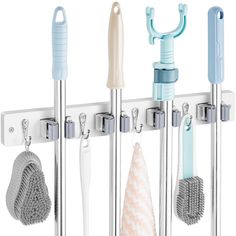 several different types of shower accessories hanging on a wall