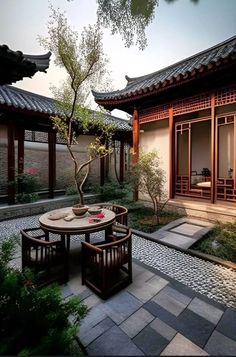 an outdoor dining area with tables and chairs