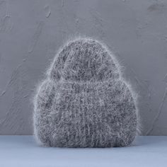 Stay warm and comfortable in style with the Classic Knitted Winter Beanie. Made from soft, cozy knit fabric, this beanie features a ribbed texture that offers a snug fit for all-day wear. The clean, minimalist design in white makes it a versatile accessory for any winter outfit. Ideal for casual outings or chilly days, this beanie will keep you warm all season long. Specifications: Pattern Type: Solid Material: Wool Fur & Cashmere Feature: Keep warm Applicable Season: Winter Style: Casual Size: Newsboy Cap Women, Newsboy Cap Men, Womens Visor, Ponytail Beanie, Womens Fedora, Mens Bucket Hats, Fedora Hat Women, Running Hats, Summer Sun Hat