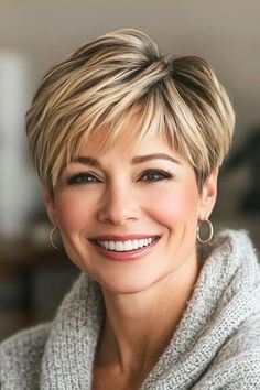 Save this pin for the best short layered haircuts for thick hair. You can get versatility out of a pixie cut, and this layered pixie proves it. Layers throughout the style give it dimension, and adding highlights really lightens the look. Long Layered Graduation Pixie, Ladies Short Hairstyles For Thick Hair, Short Haircuts For Women Over 50 With Thick Hair, Short Pixie Haircut For Thick Hair, Short Hair Cuts For Thick Straight Hair, Short Hair In Back, How Do You Curl Short Hair, Pixie Hairstyles Thick Hair, Short Pixie For Thick Hair