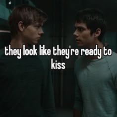 two men standing next to each other with the words they look like they're ready to kiss