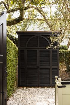 an open door leading into a garden area